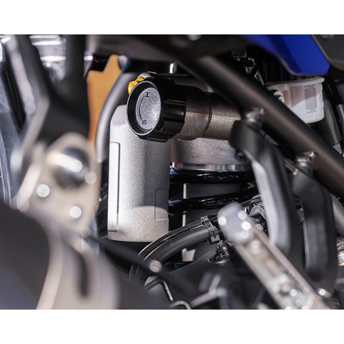 Remotely adjustable rear shock